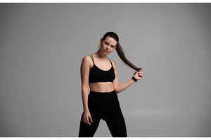 Woman posing in black sportswear, a Sports & Recreation Photo by volodymyrshtun13795