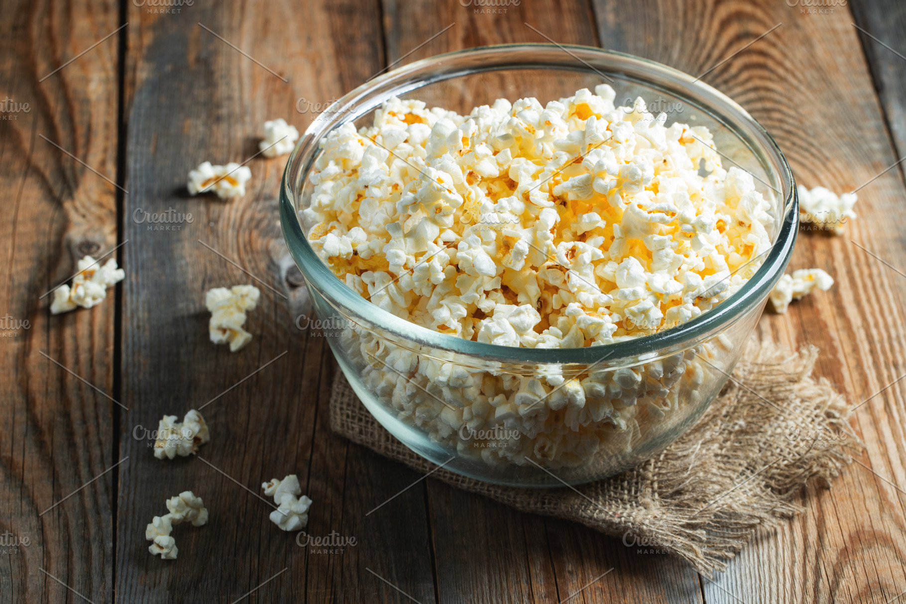 Popcorn on wood color background.Food and snack concepts ideas.Minimal style to, a Food & Drink Photo by Budarinphoto