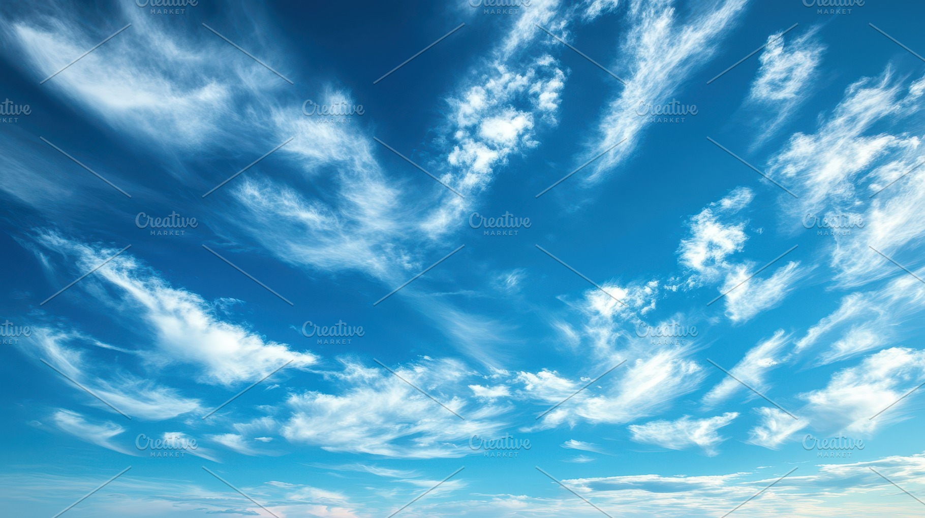 Blue sky filled with whispy clouds,, a Photo by Pixeness Studio