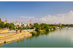 Guadalquivir river embankment in seville spain stock photo containing, an Architecture Photo by Leonid Andronov