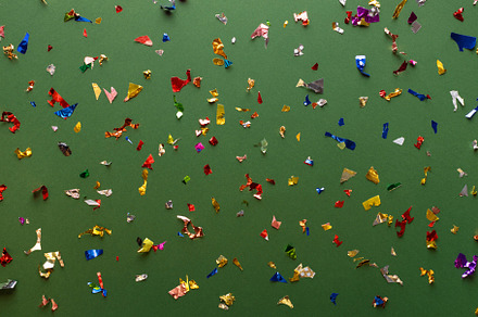 Confetti on green background