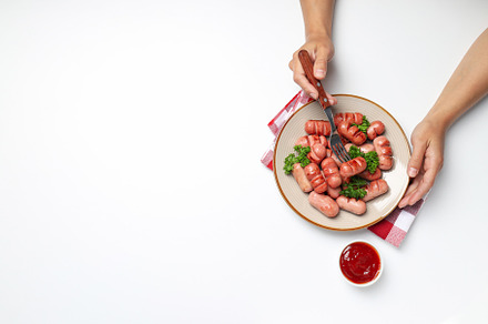 Concept of tasty food, grilled mini sausage, space for text, a Background Photo by AtlasStudio PRO