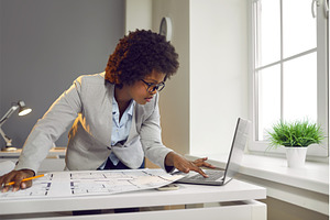 Young interior designer woman, a Business Photo by StudioRomantic