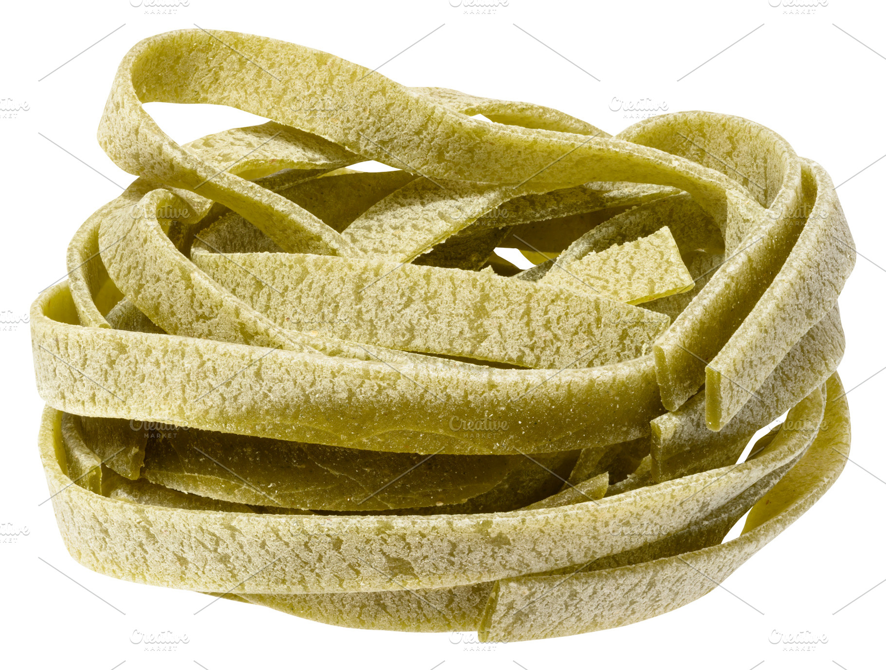 Nest of dry green egg pasta tagliatelle with spinach, isolated b, a Food & Drink Photo by ndanko