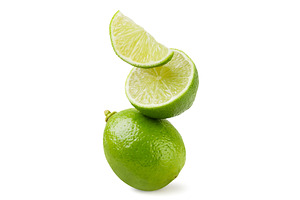 Lime, half and slice stand on top of, a Food & Drink Photo by innakreativ