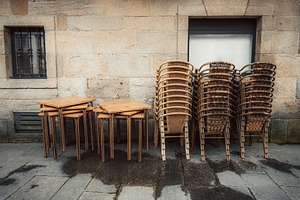 Empty cafe, chairs, tables on street, an Architecture Photo by SkyNext
