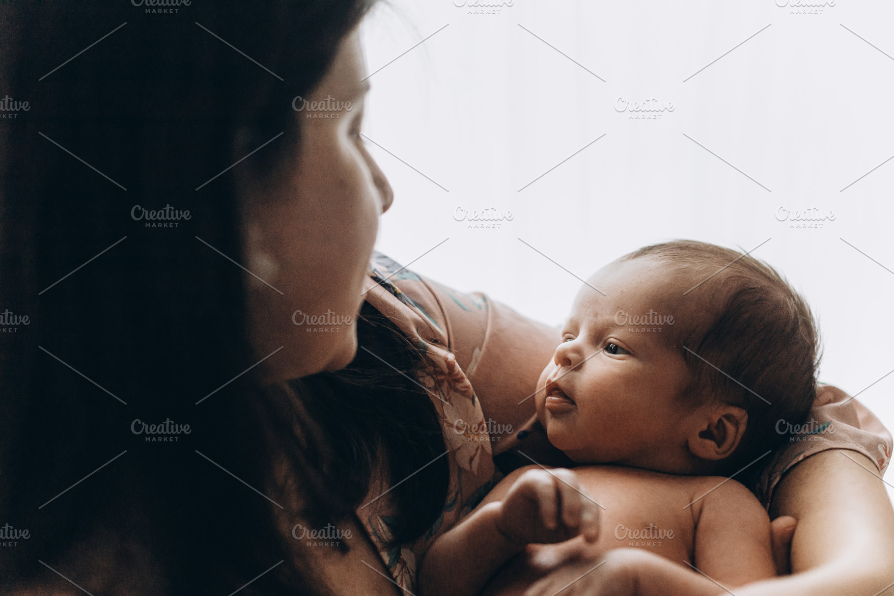Happy Mothers day! Stylish Mother holding and hugging cute newbo, a Person Photo by Sonjachni