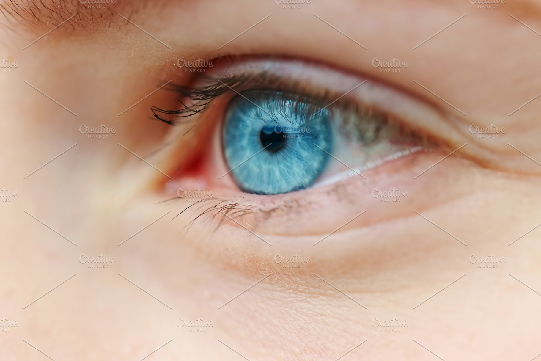 close-up photo of blue eye, a Person Photo by AlohaHawaii