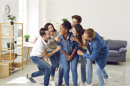 Happy young people laughing at a