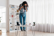 Professional Female Photographer Taking Photos Of Beauty Products In Studio, a Photo by Prostock-Studio (Thumbnail 3 of 5)