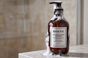 Amber Glass Pump Bottle Mockup, a Packaging Mockup by Designer Dude (Thumbnail 1 of 2)