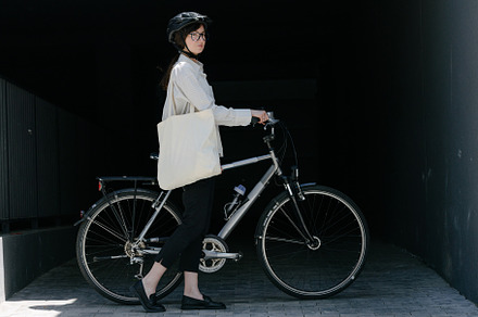 Woman holding eco bag or cotton tote