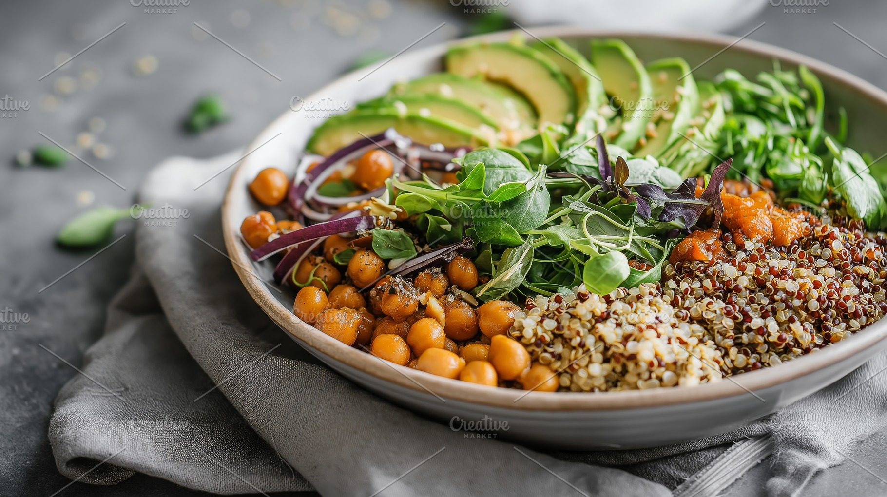 Vibrant Vegan Buddha Bowl with Avocado, Quinoa, and Chickpeas on Rustic Grey Ba, a Food & Drink Photo by Ocean Digital Art