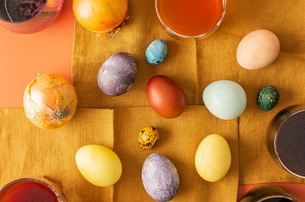 The process of dyeing Easter eggs, a Holiday Photo by Pandateam