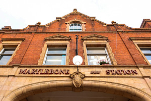 Marylebone Station exterior architecture showing brick facade, stone arches, an, a Photo by Studio ANNA