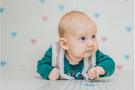 Adorable baby dressed in a Christmas