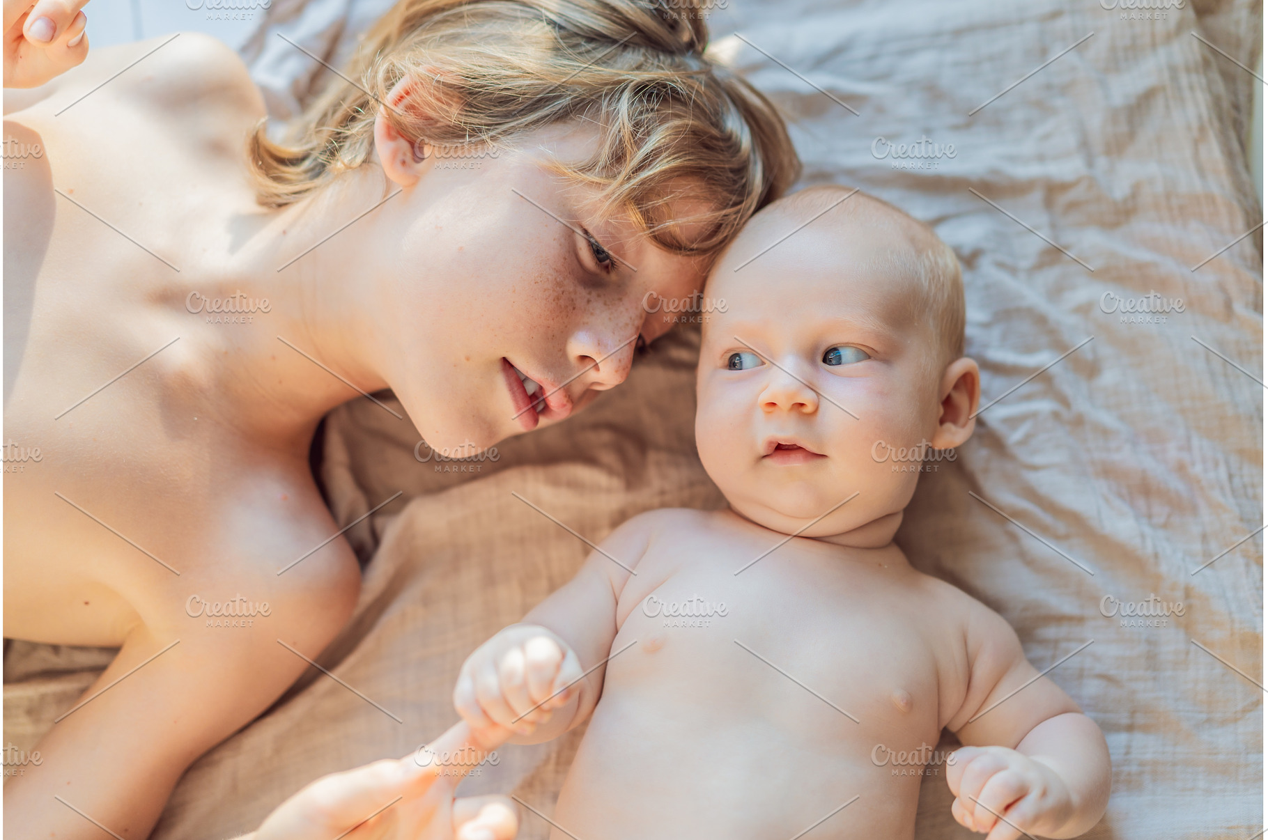 Older and younger baby brothers, a Person Photo by Elizaveta Galitskaya