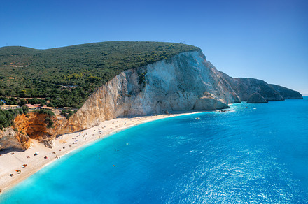 Aerial view of blue sea, mountains, white sandy beach, a Nature Photo by den-belitsky