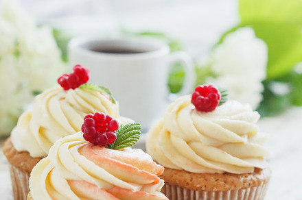 Delicate vanilla cupcakes with cream stock photo containing cream and muffin