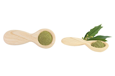 ground Laurel leaves in wooden spoon