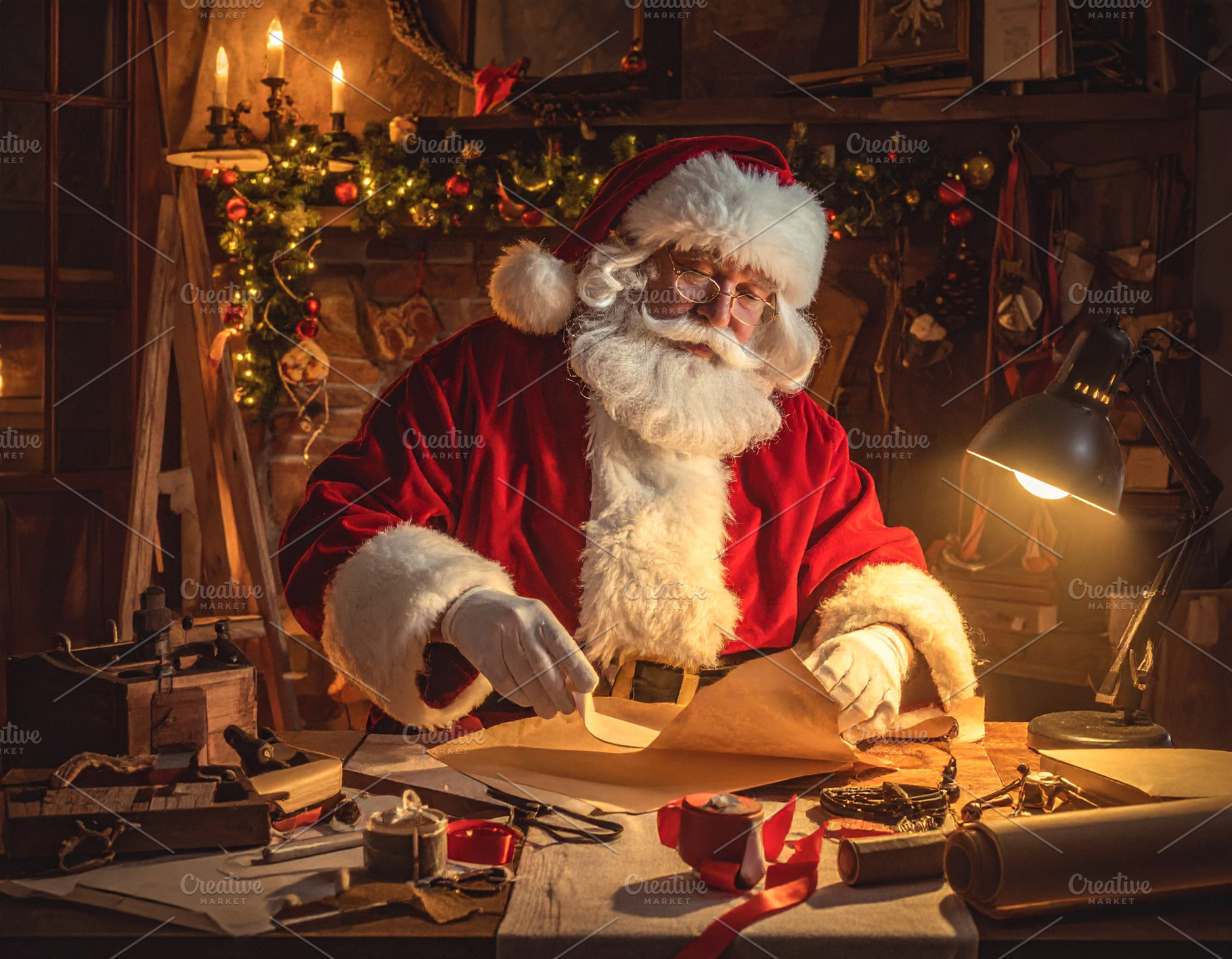 Santa Claus wrapping gifts at home, a Holiday Photo by DanFLCreativo