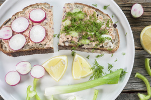 Sliced bread topped with trout, herb, a Food & Drink Photo by 1miromiro