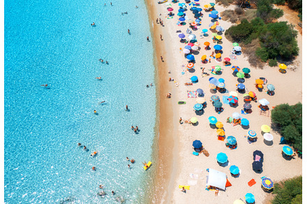Aerial view of colorful umbrellas on, a Nature Photo by den-belitsky