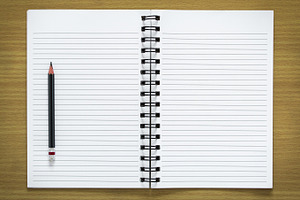 Blank spiral notebook and pencil featuring notebook, paper, and spiral