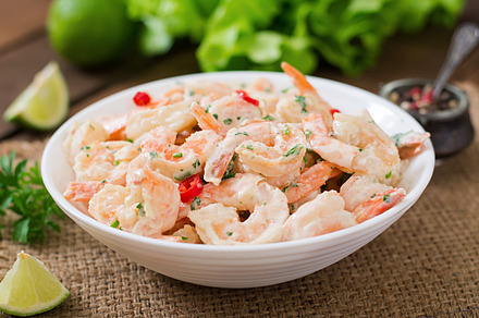 Shrimp in a creamy garlic sauce featuring shrimp, butter, and cooking