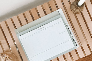Notepad on Wood Table