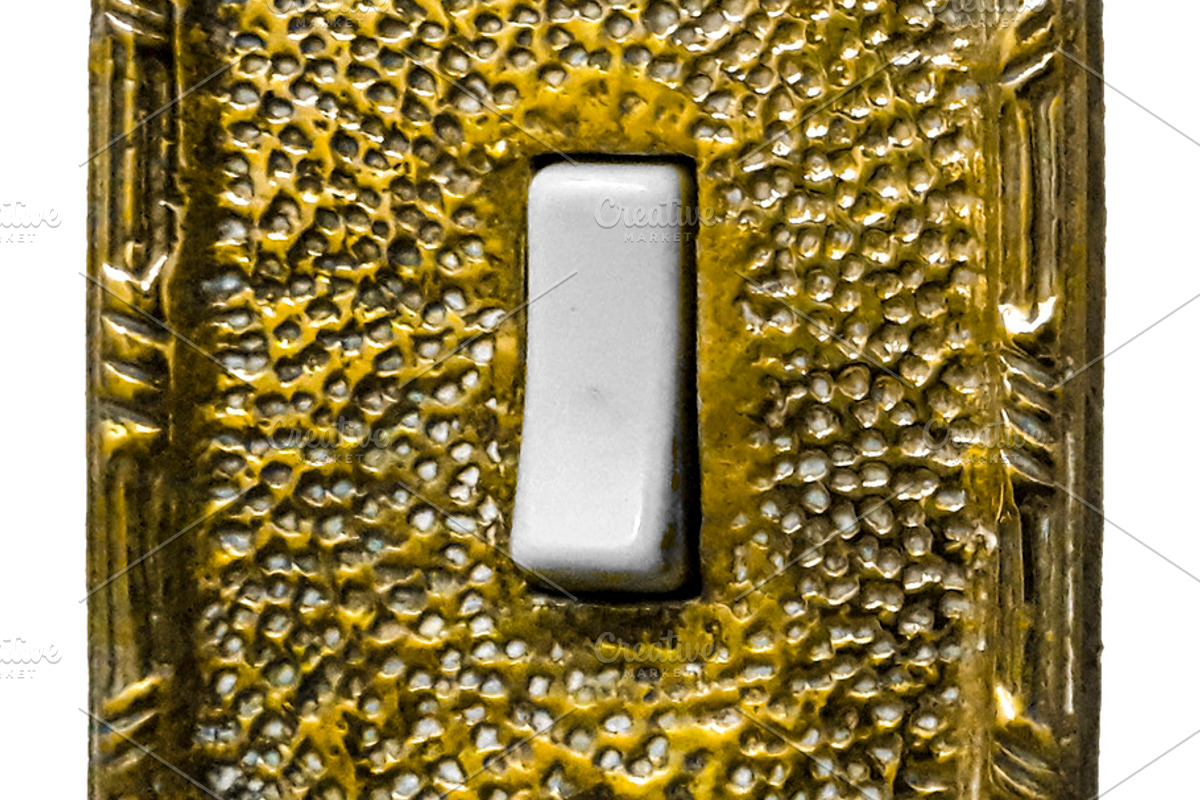 Bronze light button ornate isolated photo, a Technology Photo by DanFLCreativo (Photo 1 of 2)