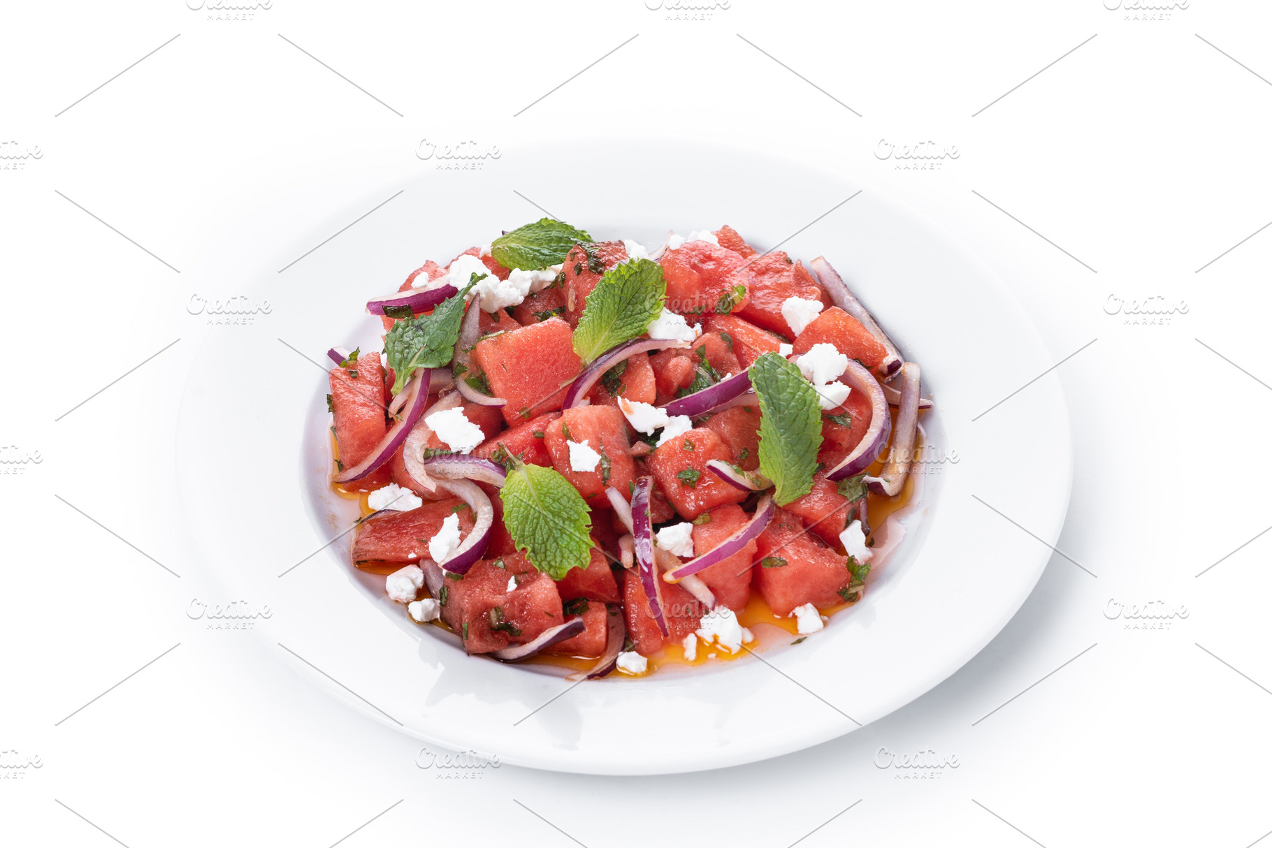 Fresh Watermelon Feta Salad with Mint and Red Onion isolated on, a Food & Drink Photo by etorres69