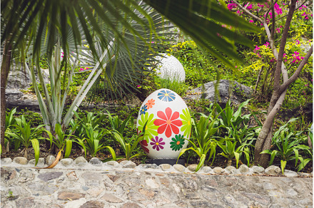 Multicolored eggs in the grass, a Holiday Photo by Elizaveta Galitskaya