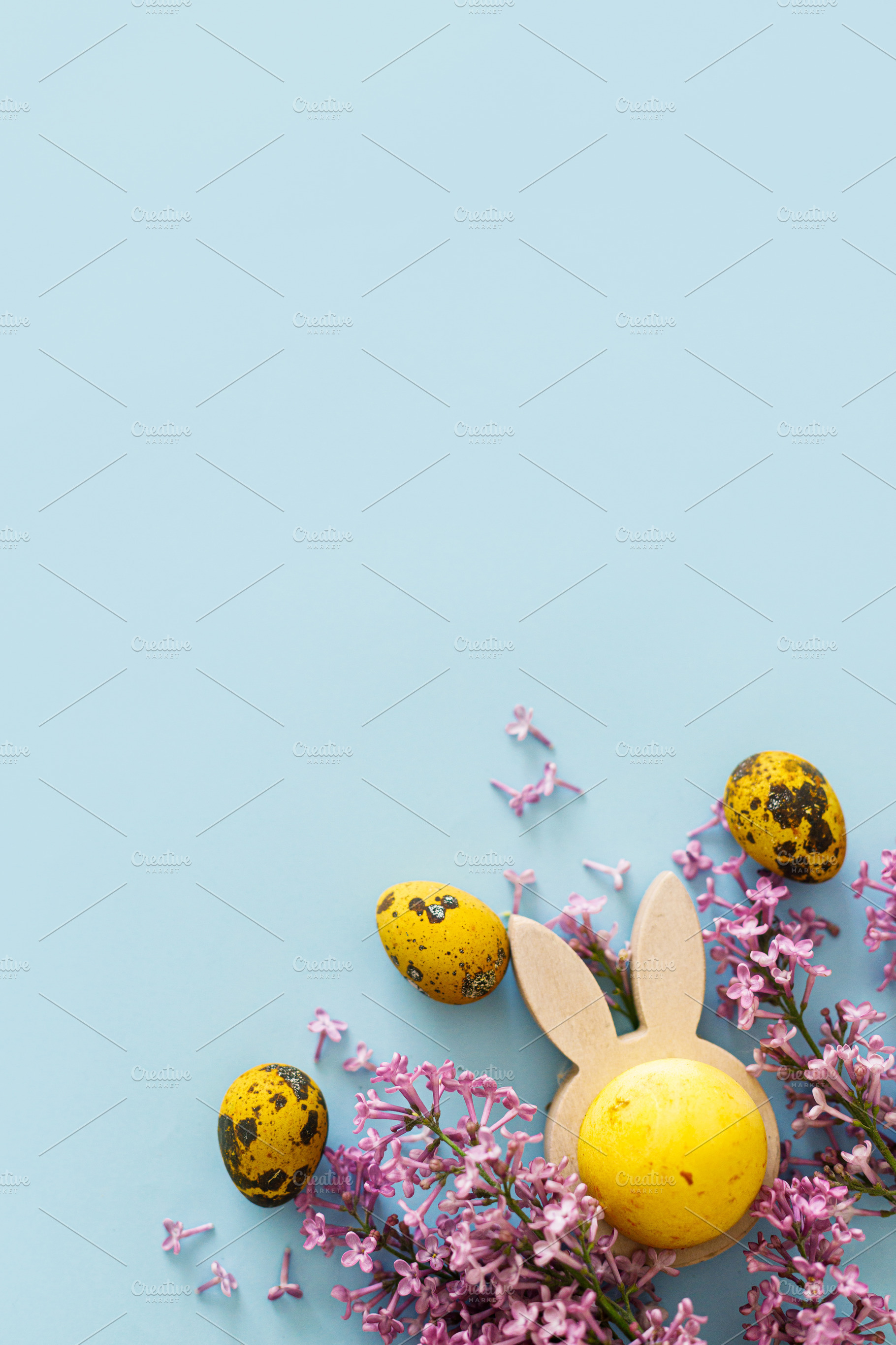 Happy Easter! Modern yellow eggs, bunny ears and lilac blossom f, a Holiday Photo by Sonjachni