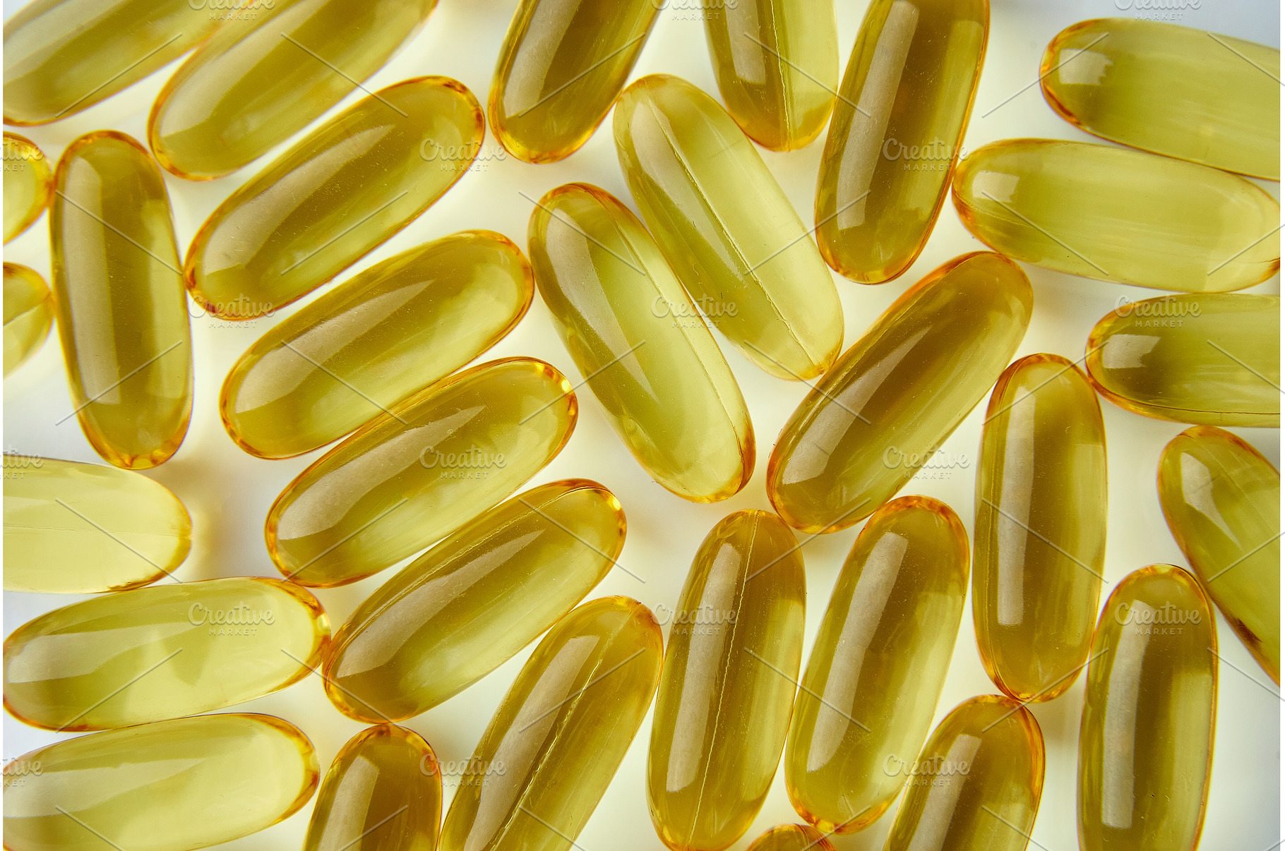 Flat lay fish oil capsules Omega 3, a Health & Medical Photo by IlliaBondarPhotography
