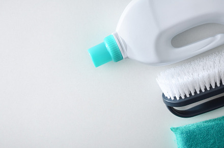 Cleaning supplies isolated on white table top view, a Health & Medical Photo by Davizro's Market