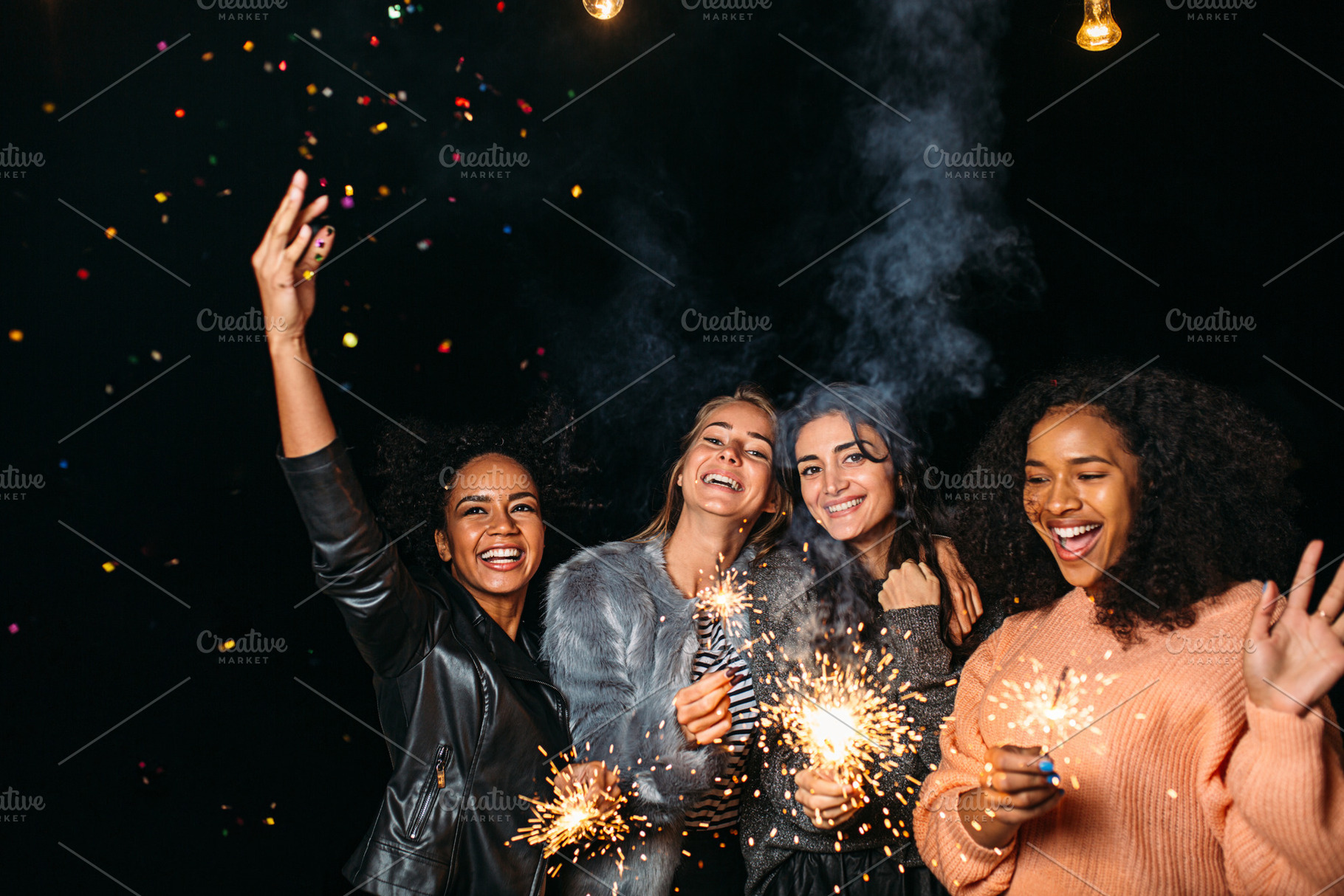 Four diverse women having fun, a Person Photo by Artem Varnitsin