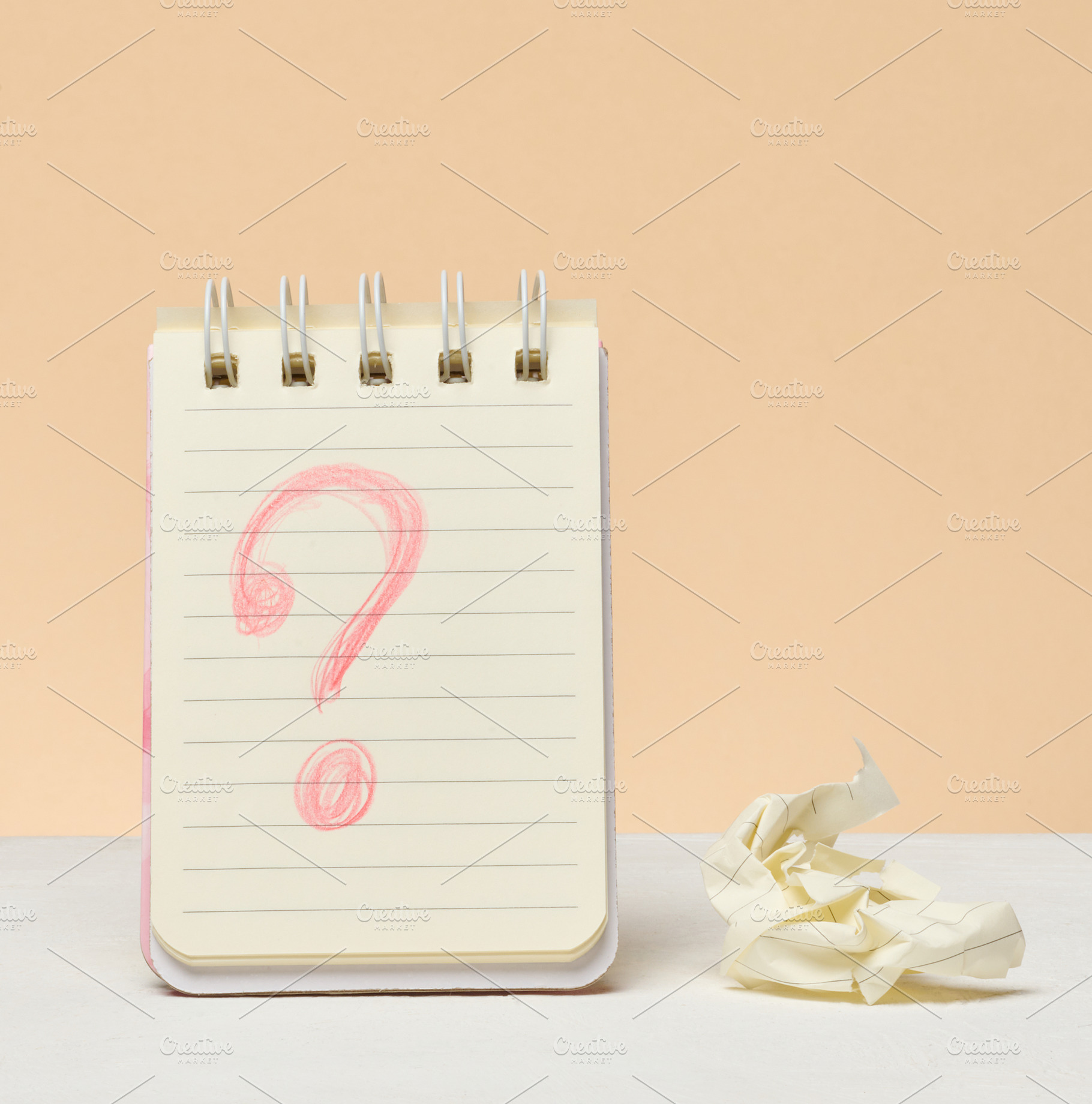 An open notebook with a question mark drawn in red pencil next t, a Business Photo by ndanko