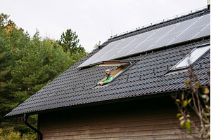 Man looking from skylight, roof, a Technology Photo by HalfPoint