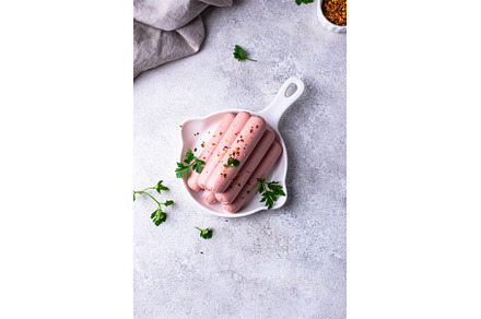 Boiled pork sausages with spices