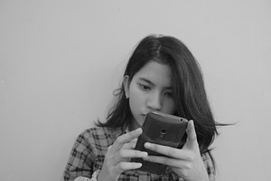 Young women looking at mobile phone