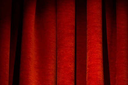 Red curtain containing red, curtain, and background, an Arts & Entertainment Photo by The Cromarie