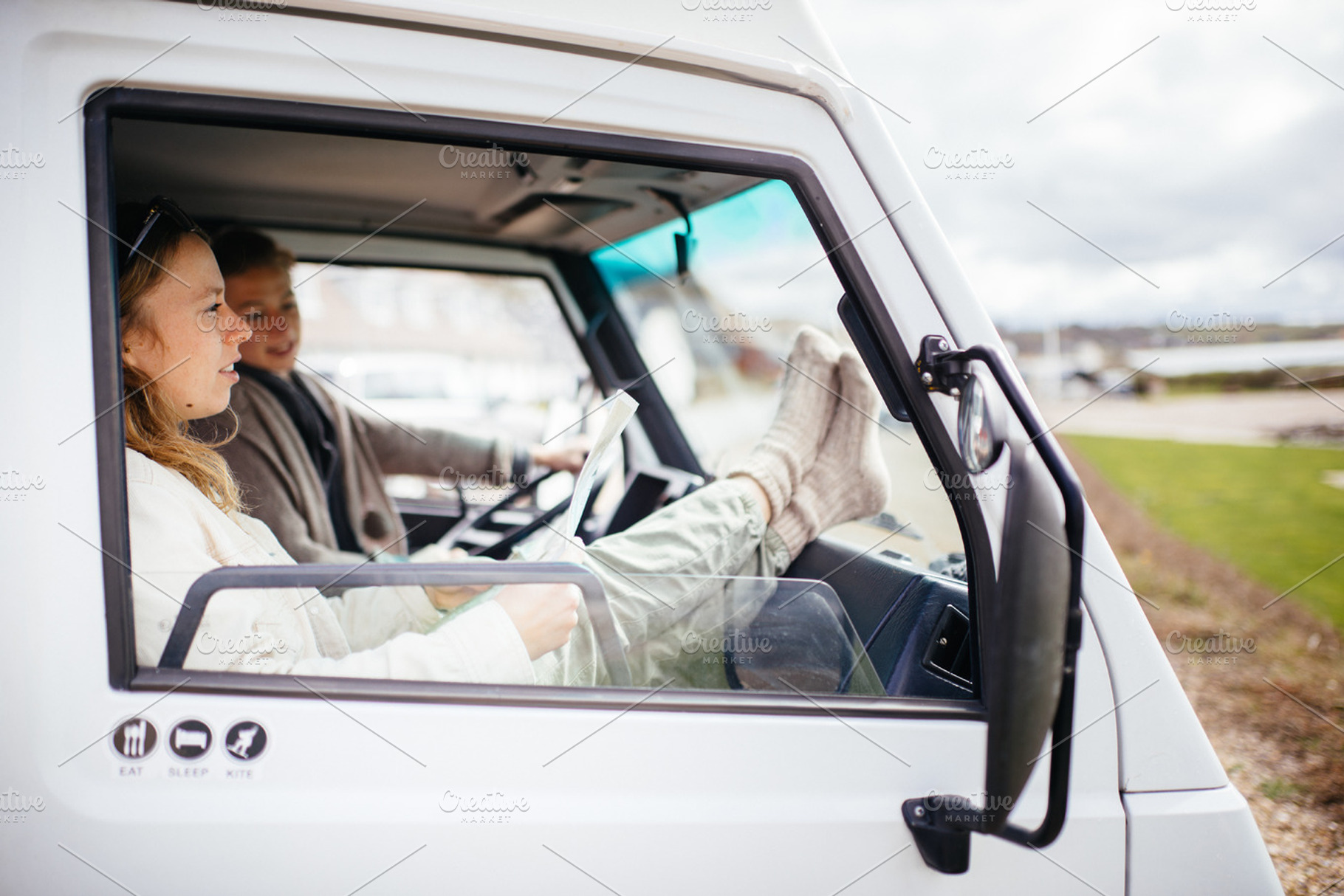 Friends driving in camper van containing outdoor, sport, and active, a Transportation Photo by Authentic Outdoor Photos