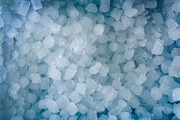 Blue background with a pile of small ice cubes top, a Food & Drink Photo by Davizro's Market (Thumbnail 1 of 2)