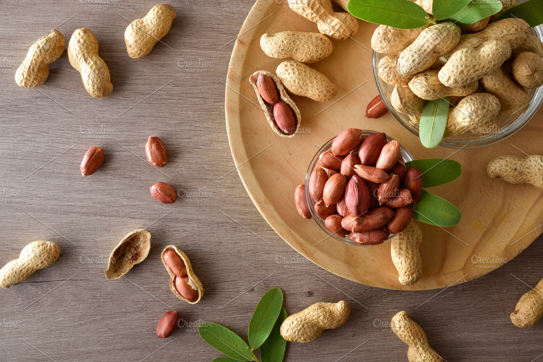 Detail peanut on wooden plate on kitchen bench top view, a Food & Drink Photo by Davizro's Market