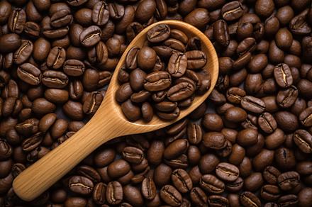 Coffee beans with wooden spoon. Generative AI, a Food & Drink Photo by AlyaAnd