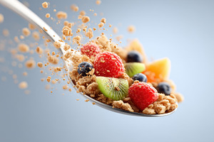 Granola and Fresh Fruit on Spoon, a Food & Drink Photo by AlyaAnd
