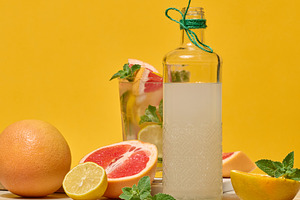 Glass bottle with homemade lemonade and a glass with a cold cock, a Food & Drink Photo by ndanko