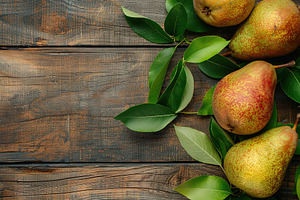 Red pears with leafs and copyspace for text on wooden table, a Food & Drink Photo by AlyaAnd