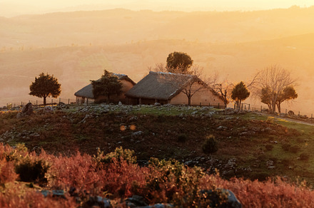 Rural cottages at sunset in a mounta, a Nature Photo by Perpis